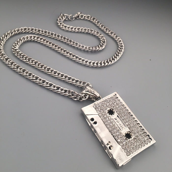 Tape microphone pendant necklace